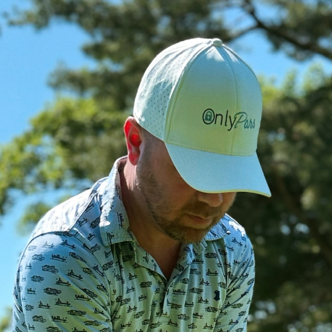 Man wearing a cap with 'onlyParis' logo outdoors